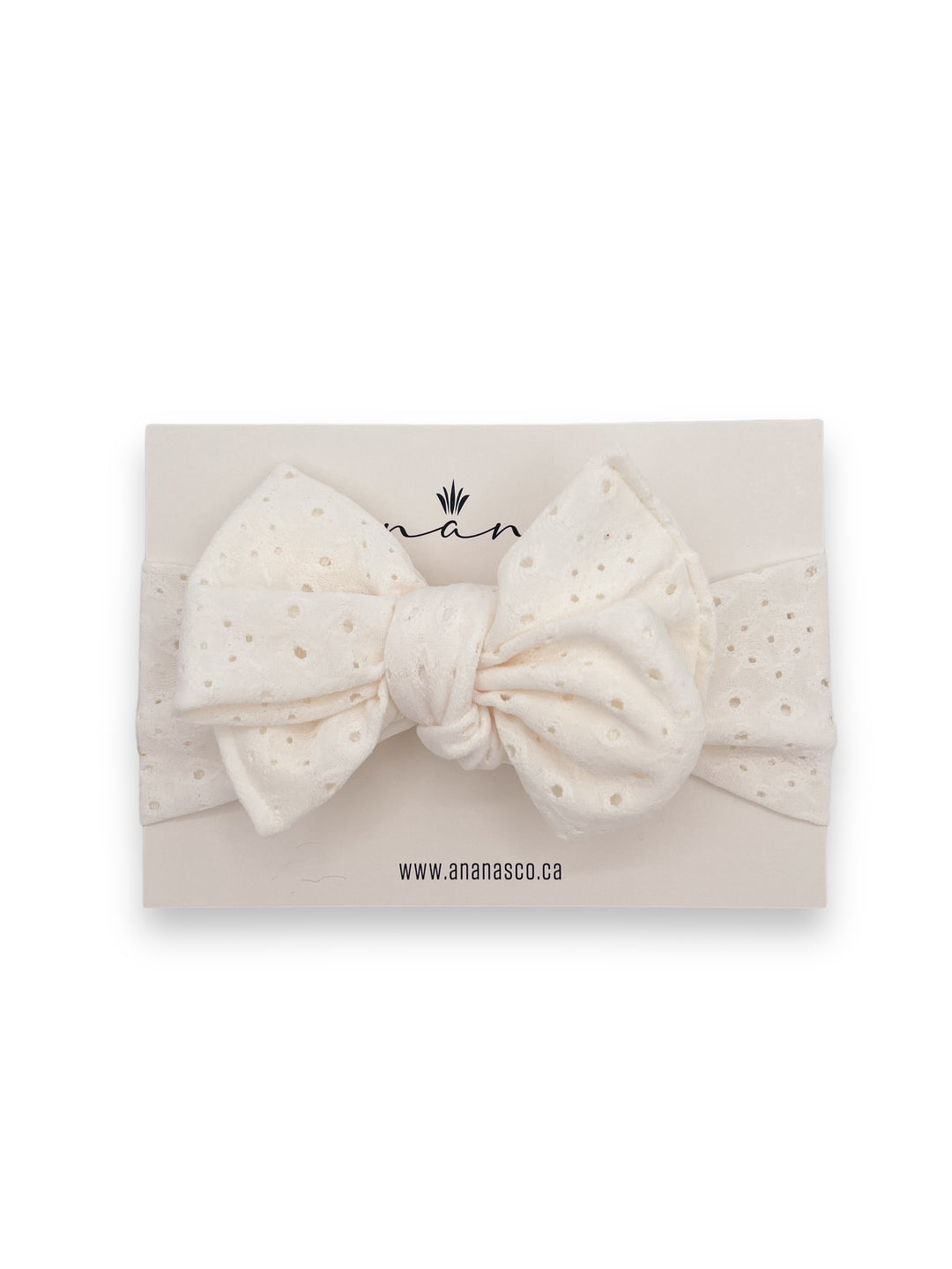 Eyelet bow headband to tie